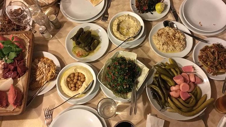 A traditional mezza dinner in Lebanon can take up to four hours and features a variety of hot and cold dishes. // © 2017 Giselle Abcarian