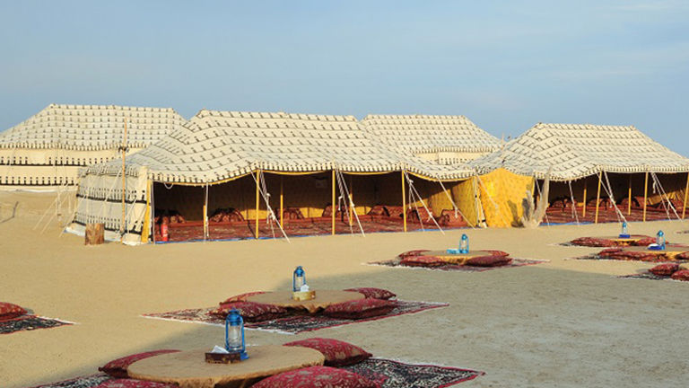 After enjoying a traditional Arabic barbecue dinner, guests can retire to Bedouin-style tents for the night. // © 2015 Gulf Adventures