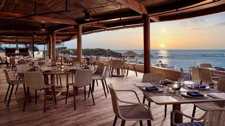 Bahia restaurant serves steak and seafood steps from the sand.