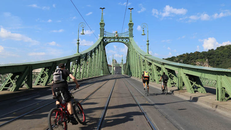 Bikers, like those in Budapest, get a chance to experience the city from a local’s point of view. // © 2016 Mindy Poder