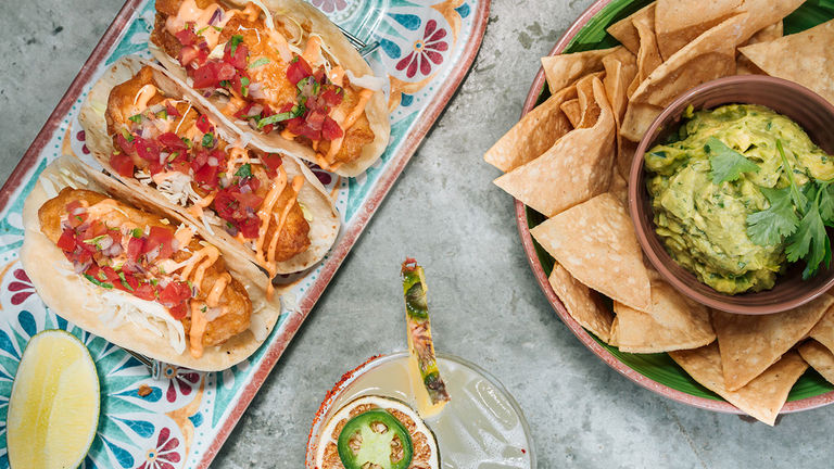 Crispy fish tacos are a must-order dish at Campo Poolside.