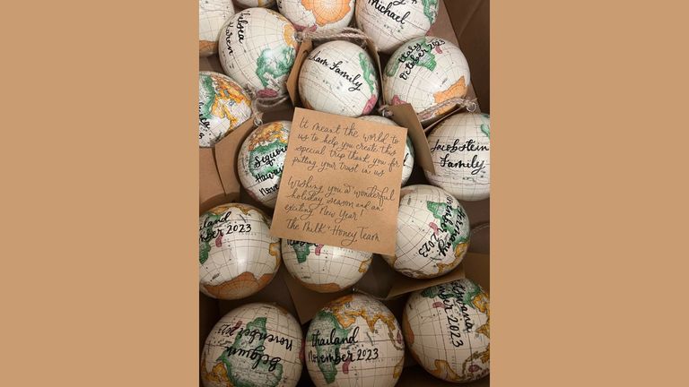 Customized holiday keepsakes remind travelers of the memories they made that year.