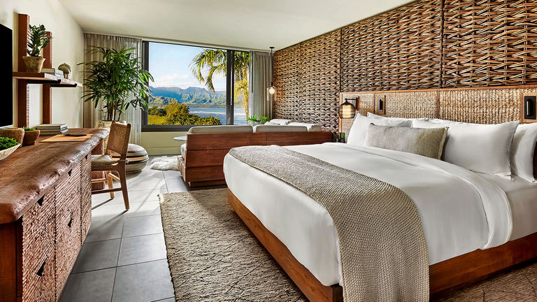 Guestrooms highlight natural textiles and textures.