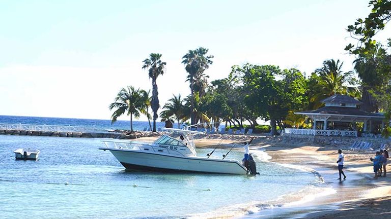 Guests can choose to participate in fishing excursions that depart from the property’s private Sunrise Beach. // © 2016 Parm Parmar