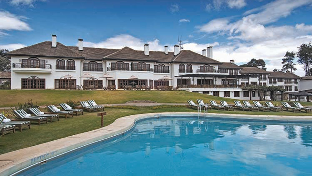 Begin the perfect honeymoon at Fairmont Mount Kenya Safari Club, which is perched on the hillside near Nanyuki, Kenya. // © 2016 Fairmont Mount Kenya Safari Club