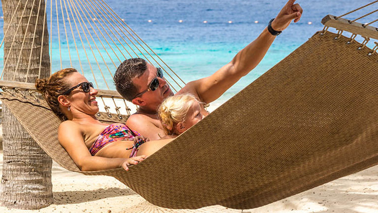 In addition to diving, the resort offers a relaxing sanctuary for couples and families. // © 2016 Harbor Village Beach Club