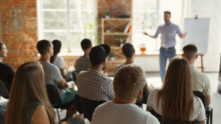 In-person courses and group financial workshops are ways to get business guidance.