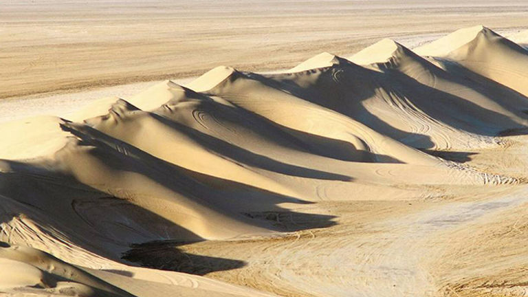 Much of Qatar’s adventure takes place in nearby sand dunes. // © 2015 Four Seasons Hotel Doha