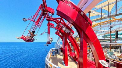 MSC World America’s Cliffhanger ride extends over the side of the ship from deck 20.
