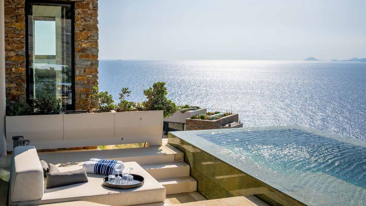 Villas at One&Only Kea Island feature private infinity pools and a sunken lounge area.
