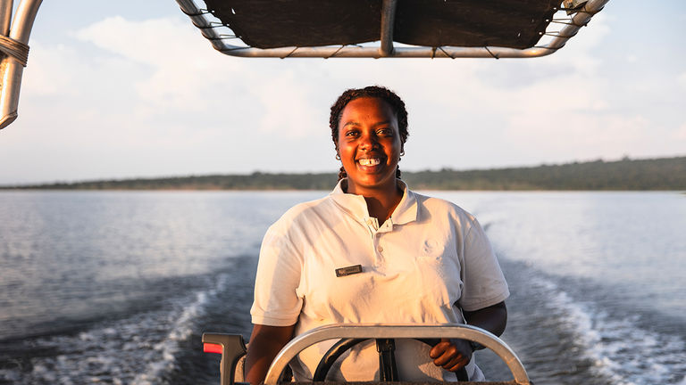 Safari guide Assiat Ingabare is the first female Rwandan guide to be accredited by the Field Guides Association of South Africa.