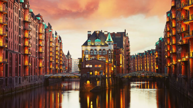 Take a boat tour through Hamburg, Germany's historic Speicherstadt warehouse district. // © 2018 Getty Images