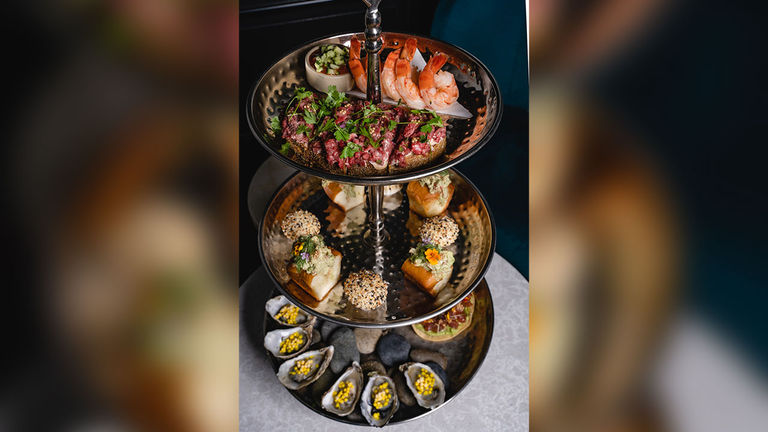 The Epic Snack Tower at Ember & Rye.