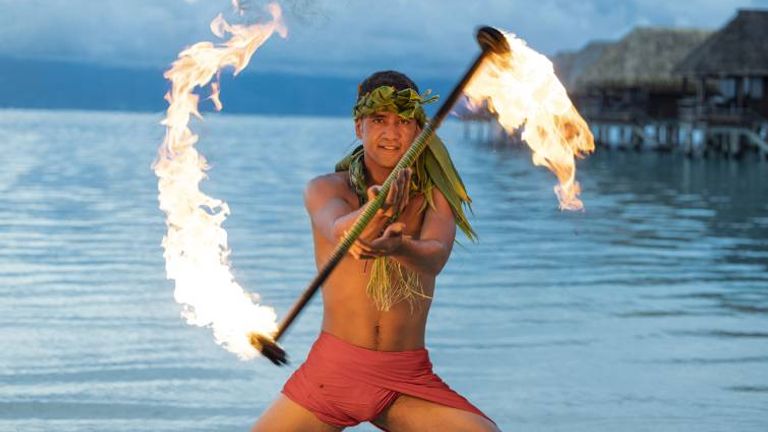 The twice-weekly Polynesian show ends with a fire dance.